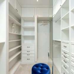 Photo by Max Vakhtbovycn: https://www.pexels.com/photo/white-classic-styled-built-in-wardrobe-with-empty-shelves-7166555/